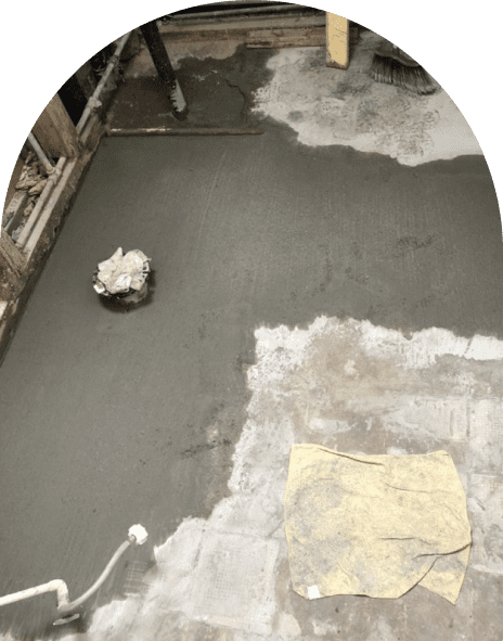 3 2 Concrete floor with tools and cloth nearby.